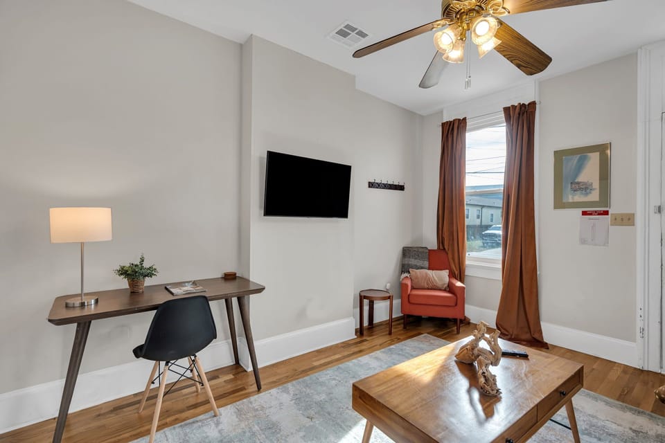 Living area with smart TV and workspace