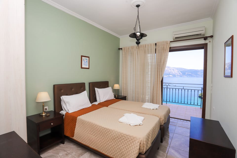 Apartment, 2 Bedrooms, Sea View | In-room safe, soundproofing, free WiFi, bed sheets