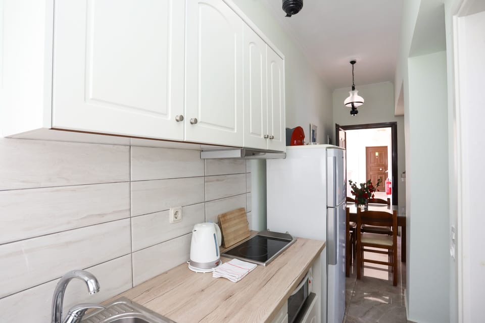 Apartment, 2 Bedrooms, Sea View | Private kitchen | Oven, stovetop, coffee/tea maker, electric kettle