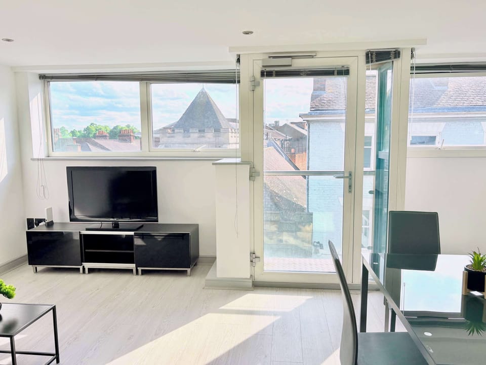 omfortable lounge area with stylish seating and a smart TV, creating a perfect spot for relaxing after a day exploring York’s historic attractions.