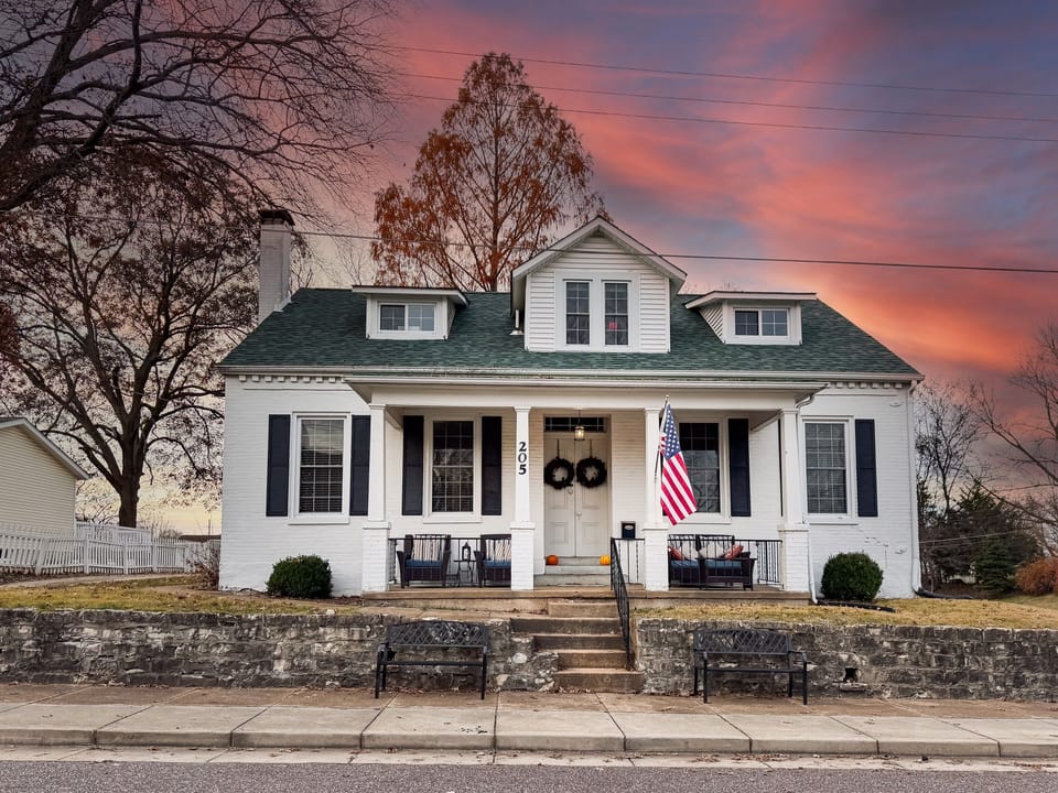 Over a century old, Aussie Cottage has been updated to modern conveniences, adding a beautiful charm to this brick home that is close to Purina Farms, wineries, Katy Trail, weddings and downtown WashMo events and restaurants.