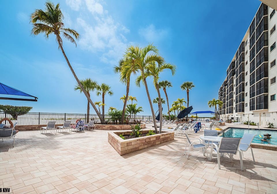 Carlos Pointe Pool and Sundeck with a generous amount of lounge chairs for guests