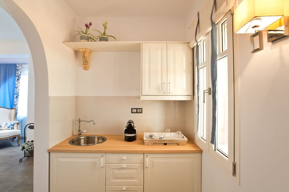 Junior Suite, Partial Sea View | Coffee and/or coffee maker