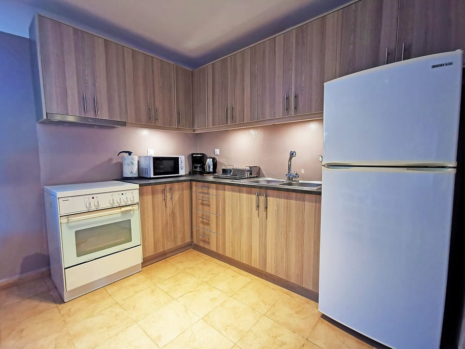 House, 2 Bedrooms, Smoking, Terrace | Private kitchen | Microwave, coffee/tea maker, highchair