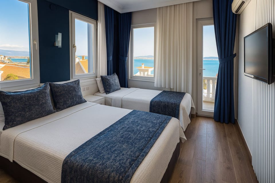 Standard Triple Room, Multiple Beds, Sea View | Premium bedding, minibar, in-room safe, blackout drapes