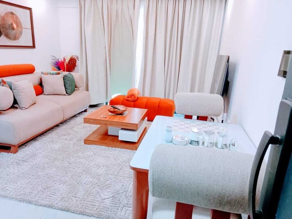 Classic Apartment, Balcony, City View | Living area | 55-inch Smart TV with cable channels, Netflix, first-run movies