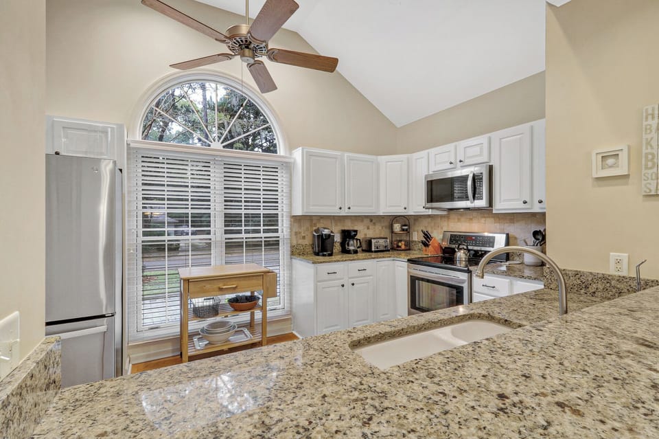4 East Garrison | Kitchen w/ large window views - 4 East Garrison | Kitchen w/ large window views