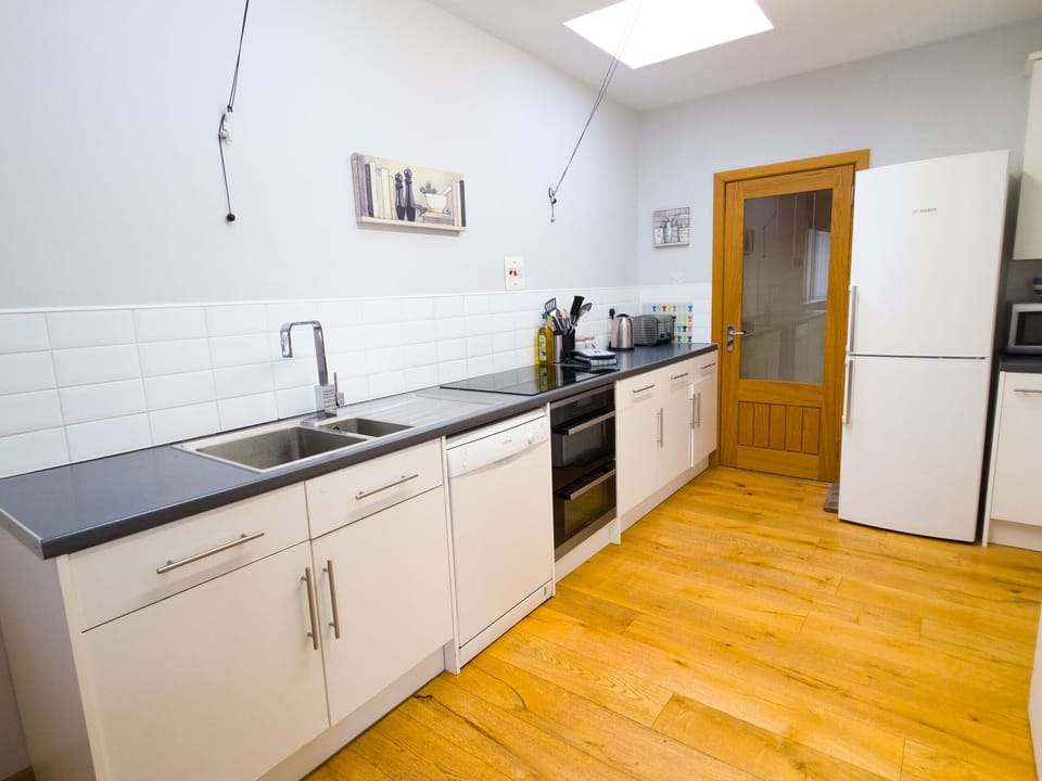 Functional family-friendly kitchen ideal for preparing meals together.