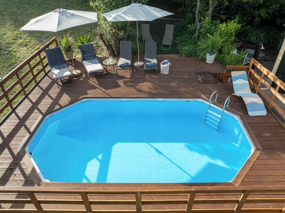 Seasonal outdoor pool, pool umbrellas, sun loungers