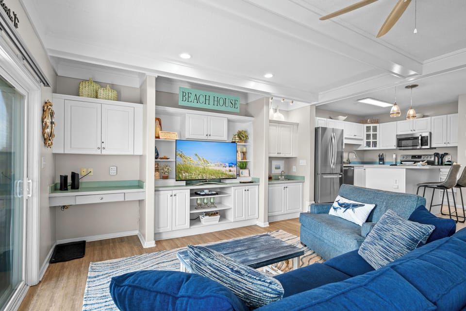Unwind in your bright coastal living space with ocean-themed TV entertainment and a fully equipped kitchen for home-cooked meals.