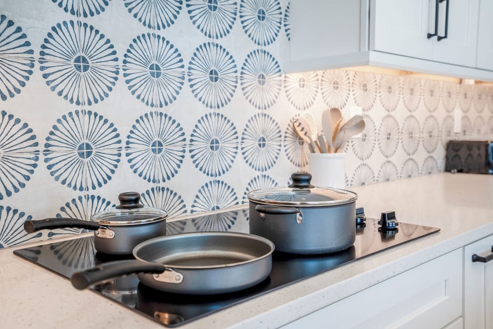 Cook comfortably in the fully stocked full kitchen with all the essentials - from pots/pans, baking sheets, cutting boards, blender, and more! 
