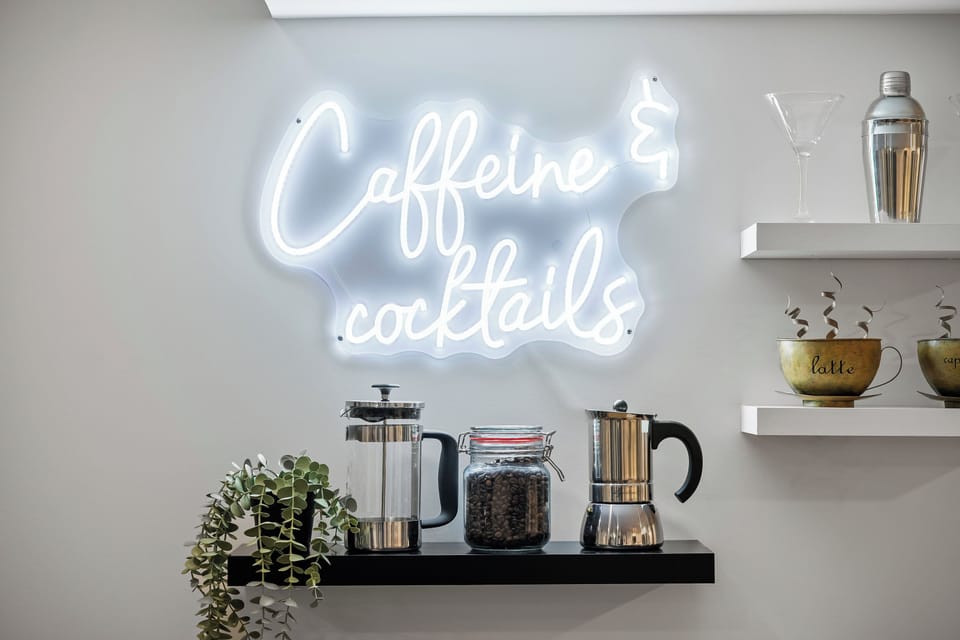 Bright and stylish coffee and cocktail station with everything you need to enjoy your morning brew or an evening drink.