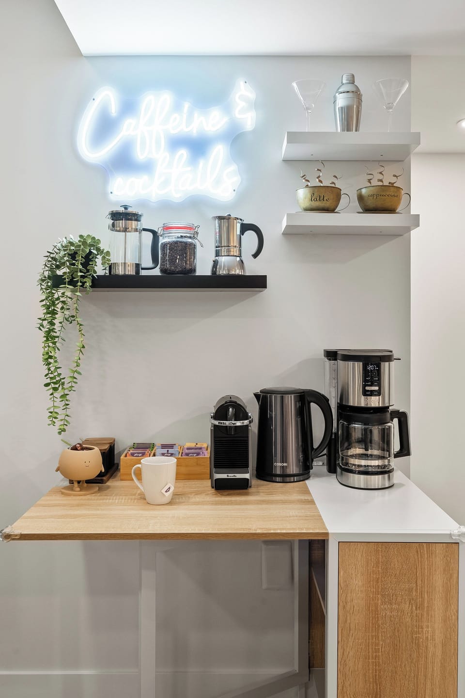 Enjoy a fully stocked coffee and tea bar with a Nespresso, drip coffee maker, kettle, and a variety of blends to start your morning right