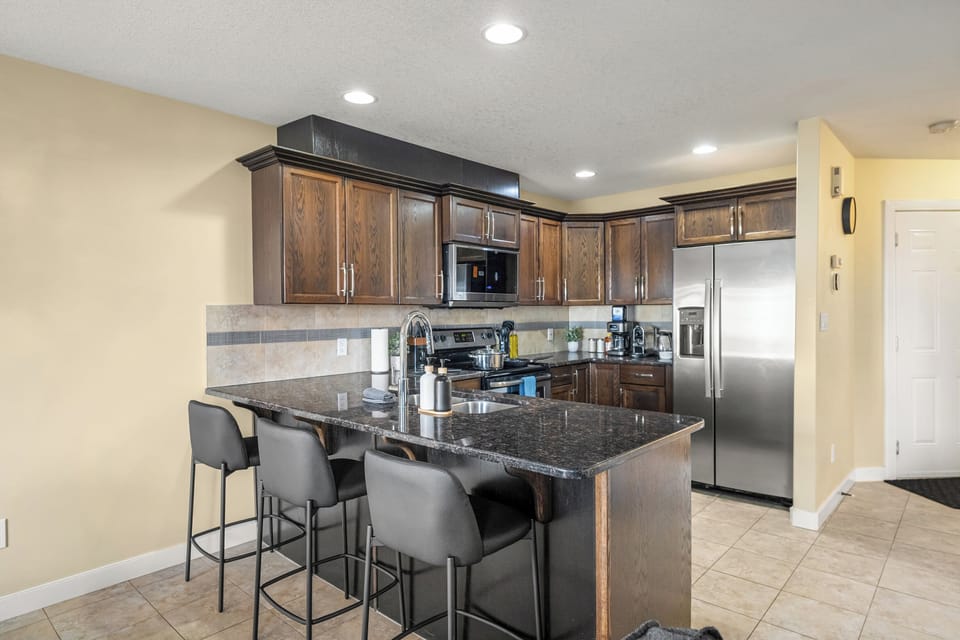 Open-concept kitchen with plenty of counter space and a view to the dining area. Ideal for cooking while staying connected.
