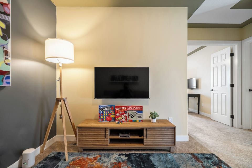 Bright and inviting with a playful pop of color. A perfect spot to unwind, read, or enjoy some screen time.