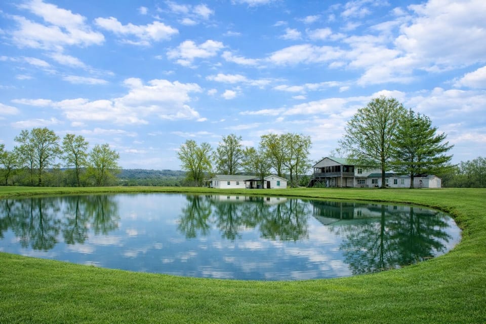 2 homes for with 1 booking!!!
A private pond reflecting wide country skies, two homes on five quiet acres, and room for family, friends, and memories to unfold.
Fish the pond. Soak in the hot tub. Watch the sunset from the porch.
This is the kind 