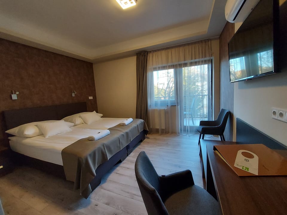 Deluxe Room, Non Smoking, Terrace | Memory foam beds, minibar, in-room safe, individually decorated