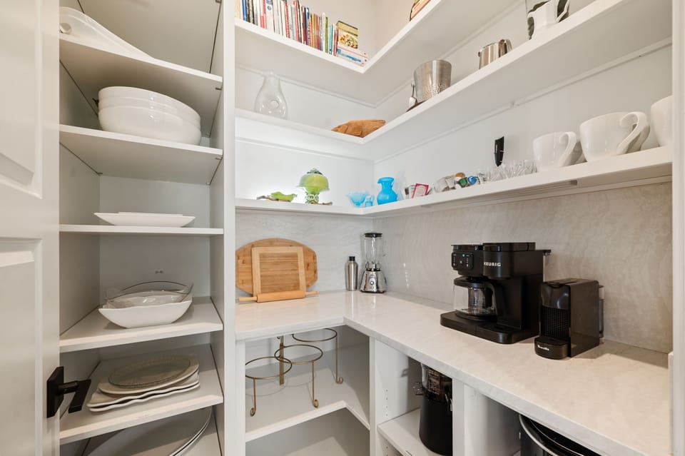 Walk-in pantry, coffee station, blender, and more