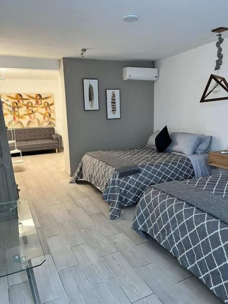 Family Triple Room, Garden View | Blackout drapes, iron/ironing board, free WiFi
