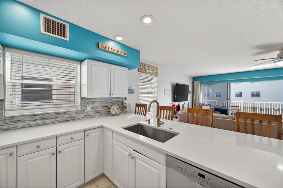 Open-concept kitchen flowing into the dining area for easy gathering.