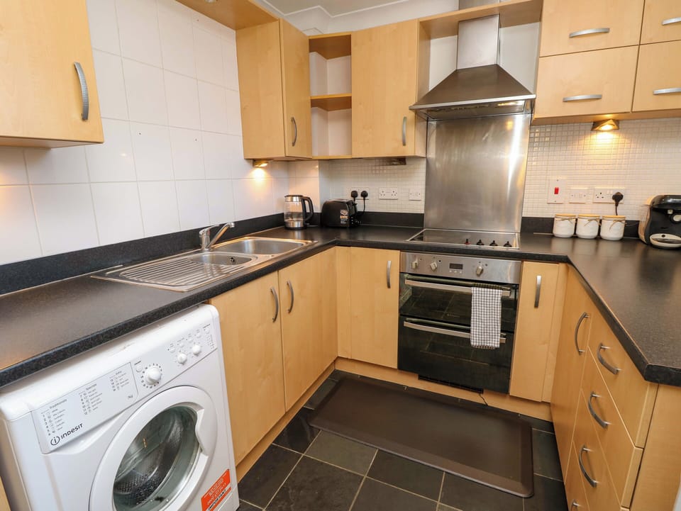 Fridge, microwave, toaster, cookware/dishes/utensils