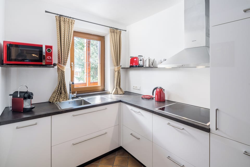 Premium Apartment, 2 Bedrooms, Balcony, Mountain View (Andreas Hofer) | Private kitchen | Full-size fridge, microwave, stovetop, dishwasher