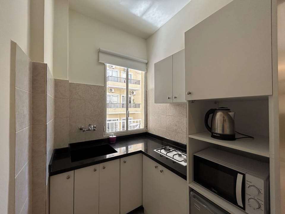Studio, 1 Double Bed, Balcony, City View | Private kitchenette | Mini-fridge, microwave, stovetop, electric kettle