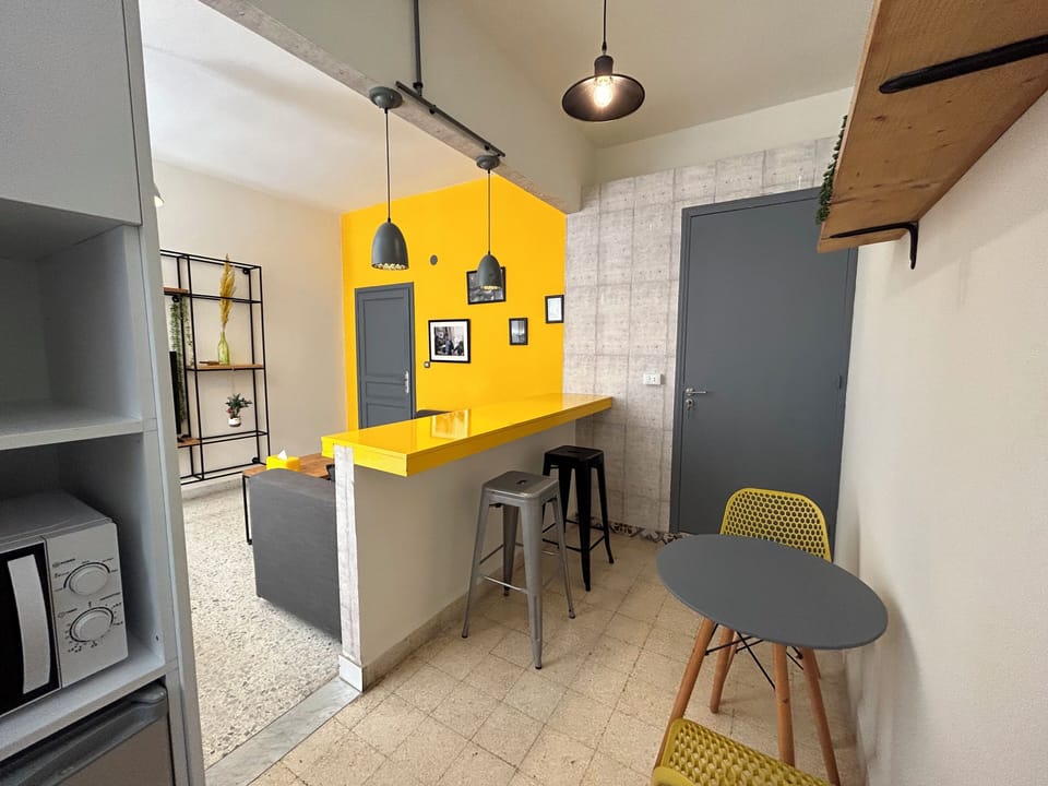 Studio, 1 Double Bed, Balcony, City View | In-room dining