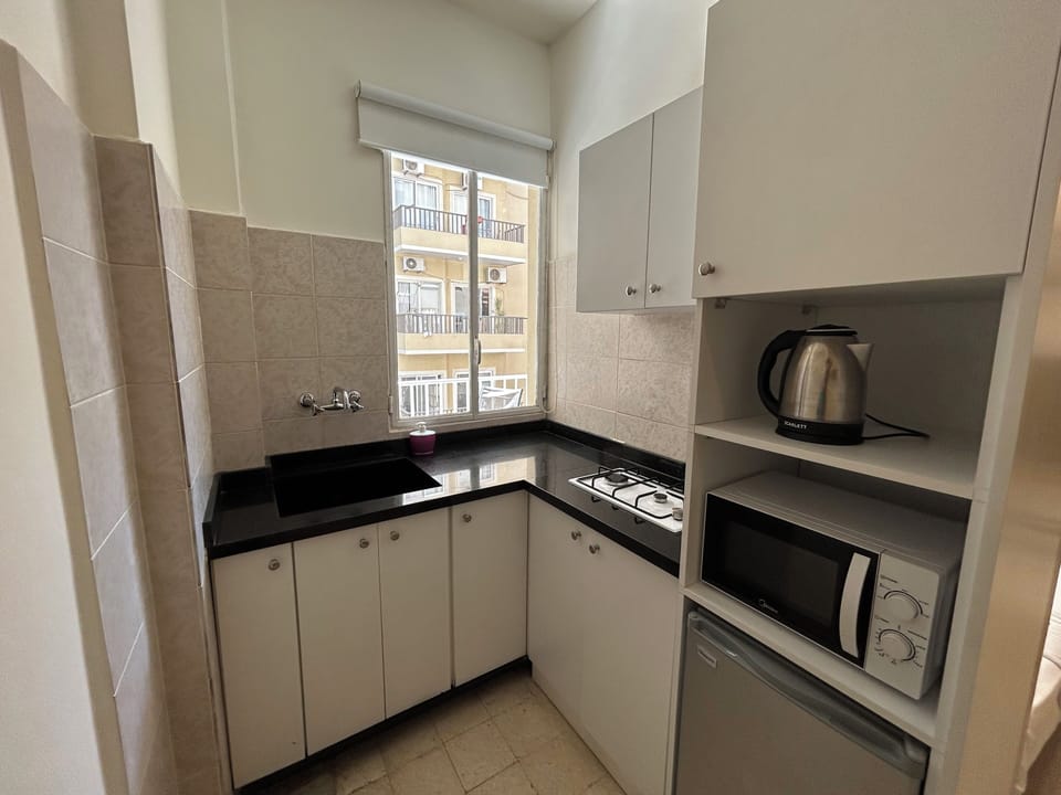 Studio, 1 Double Bed, Balcony, City View | Private kitchenette | Mini-fridge, microwave, stovetop, electric kettle