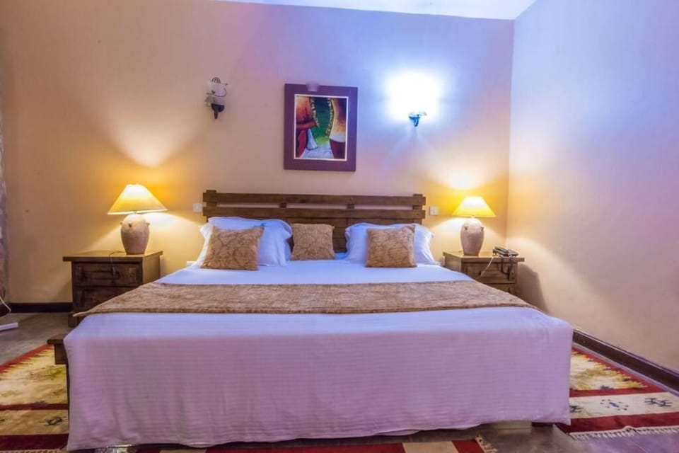 Deluxe Single Room | Living area | 55-inch Smart TV with satellite channels, Netflix, streaming services