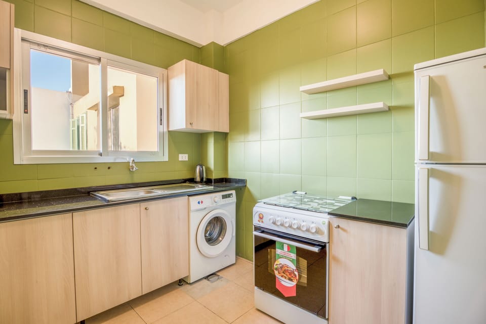 Apartment, 2 Bedrooms, Balcony, City View | Private kitchen | Full-size fridge, microwave, oven, stovetop