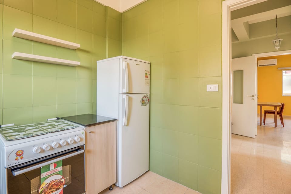 Apartment, 2 Bedrooms, Balcony, City View | Private kitchen | Full-size fridge, microwave, oven, stovetop