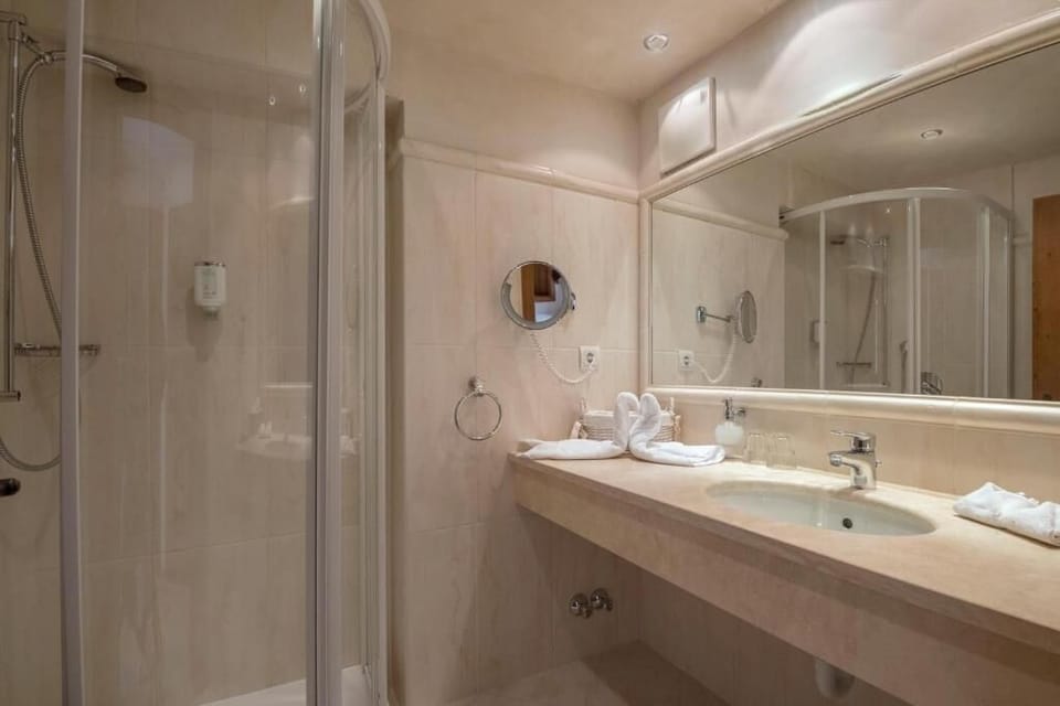 Double Room, Balcony, City View | Bathroom | Bathrobes, slippers