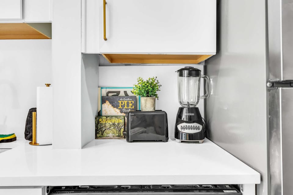COFFEE CORNER: Keurig station with K-cups ready. Turn morning routines into vacation luxury! Perfect for families exploring Savannah. Reserve today! #CoffeeStation #SavannahCharm