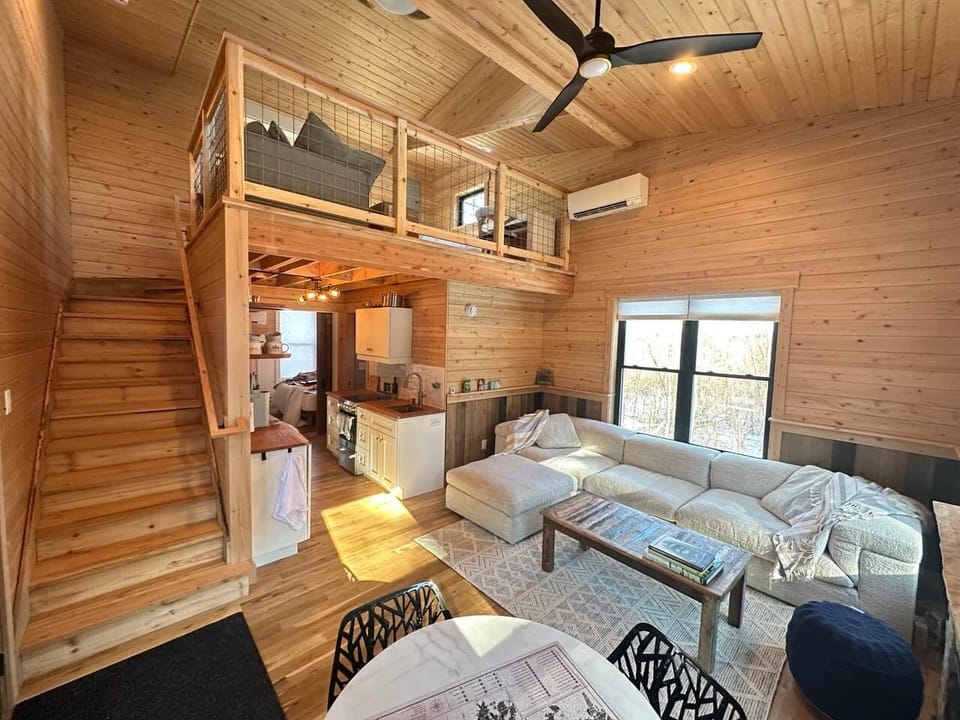 Treehouse 1 living room looking at kitchen and loft