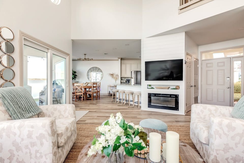 An open floor plan with a cozy fireplace -perfect for family gatherings.
