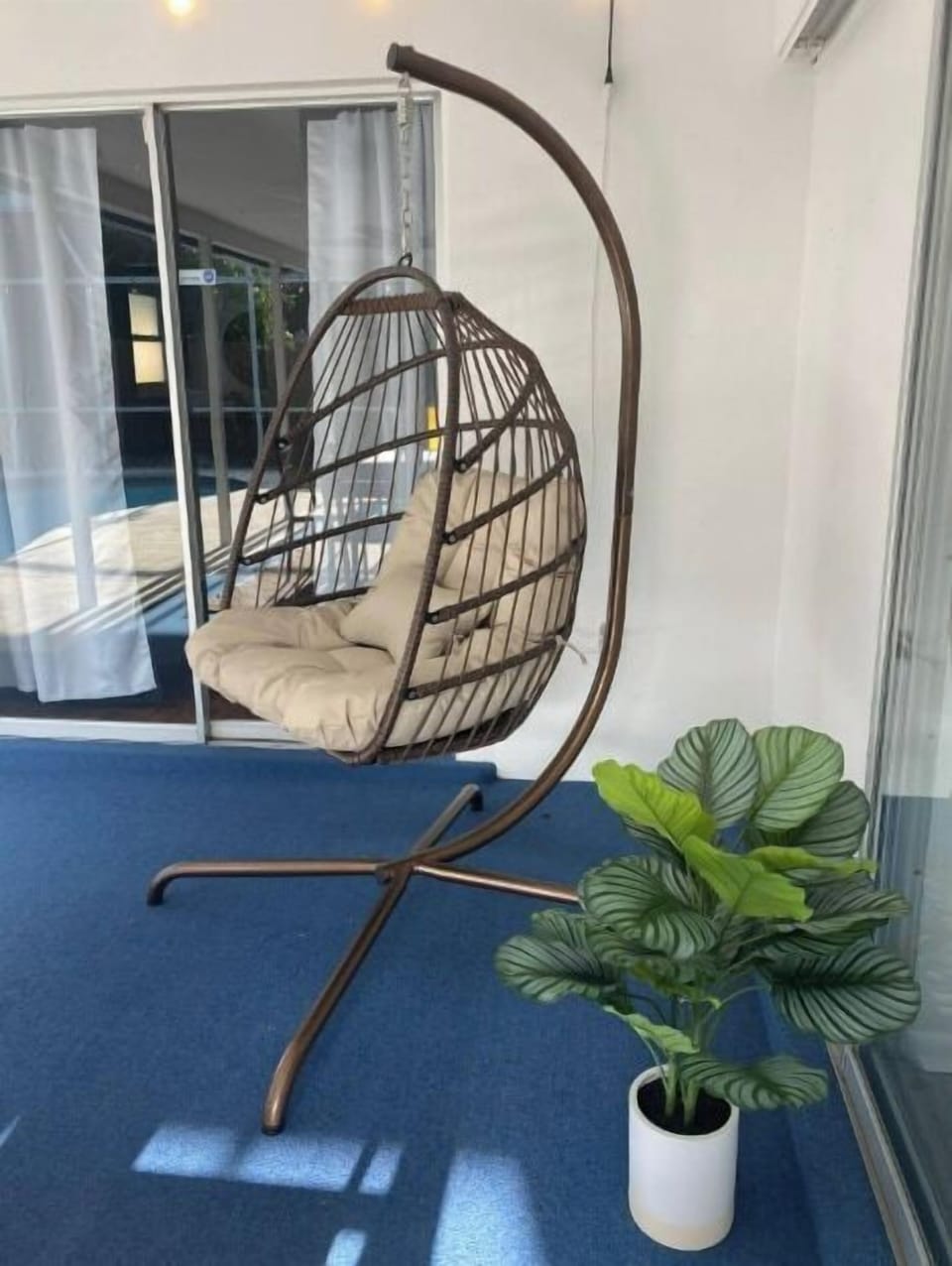 Our cushioned egg chair is great for drinking your morning coffee or for an afternoon read.