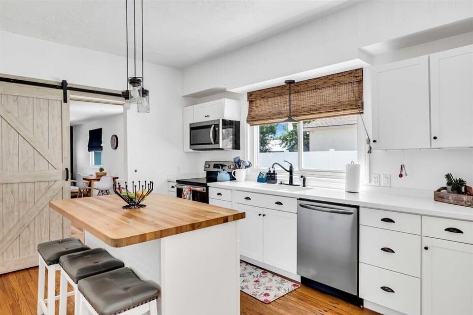 There is a connecting door to the apartment side in the kitchen