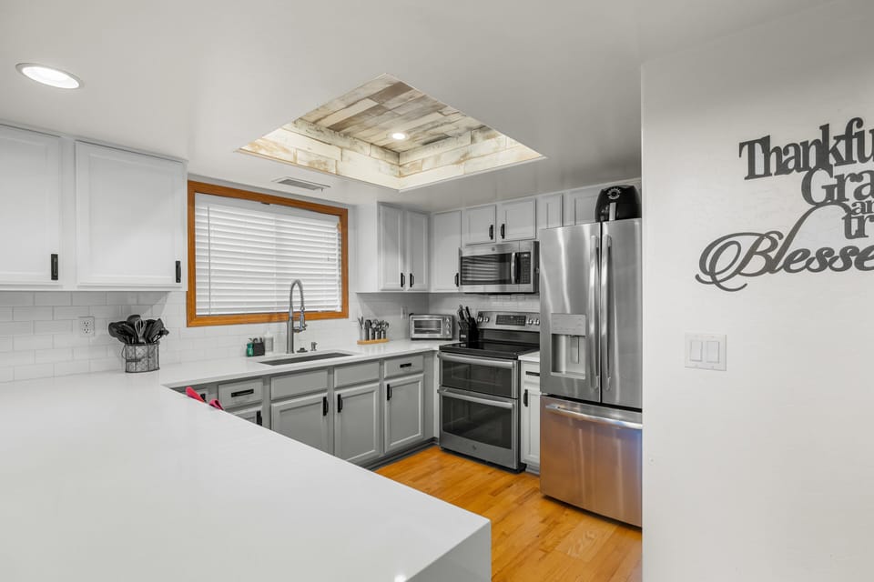 Modern kitchen with all the necessities. Perfect for cooking family meals.