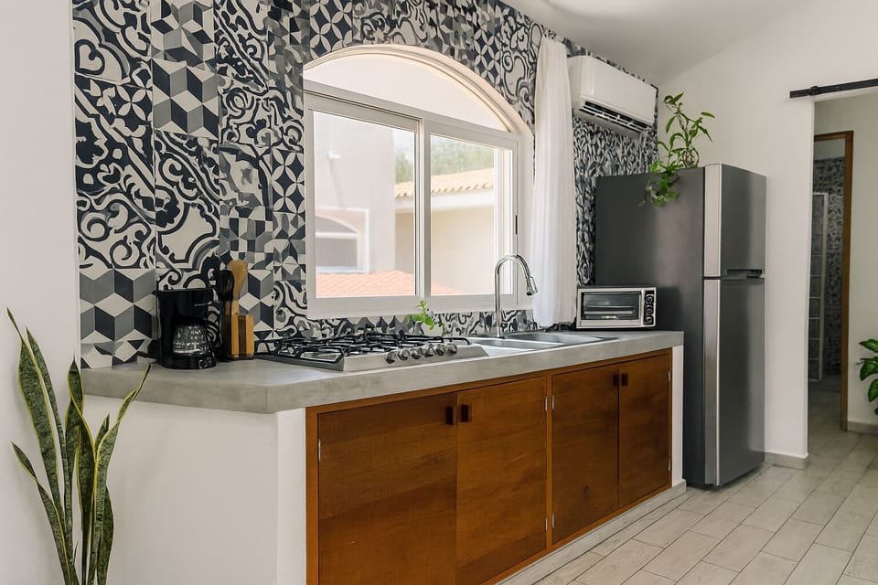 Apartment, Private Bathroom, City View | Private kitchen | Microwave, stovetop, coffee/tea maker, cookware/dishes/utensils