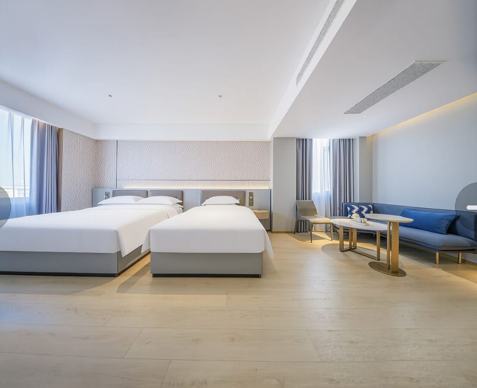 Family Triple Room, City View | Premium bedding, down comforters, memory foam beds, minibar (free items)