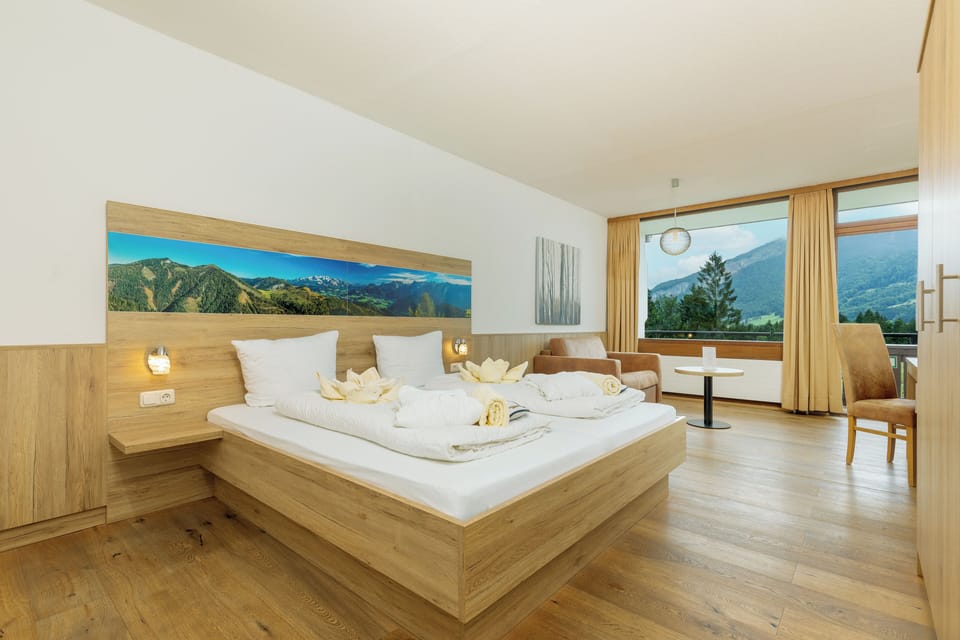 Comfort Triple Room, Multiple Beds, Non Smoking, Mountain View | Desk, blackout drapes, free WiFi, bed sheets