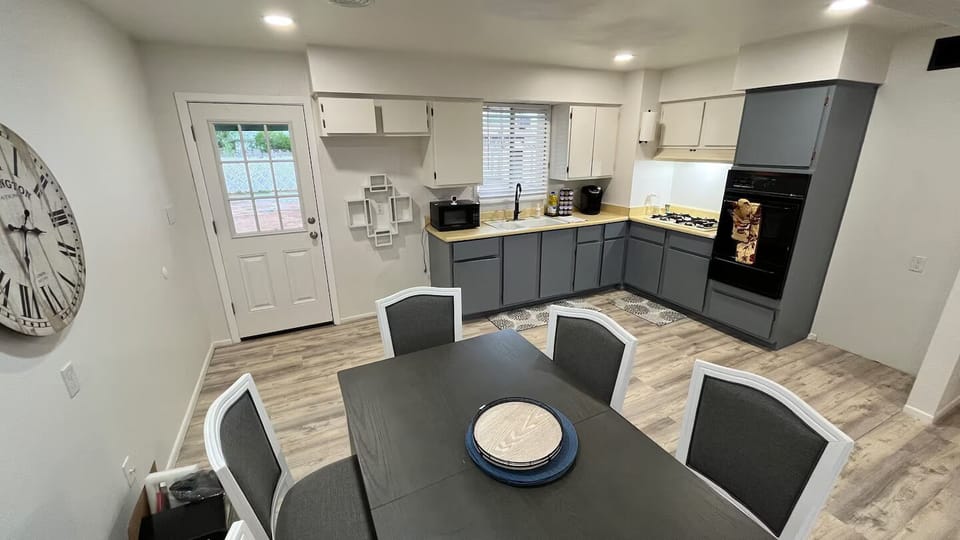 Conversations flow easily at this cozy dining table.
