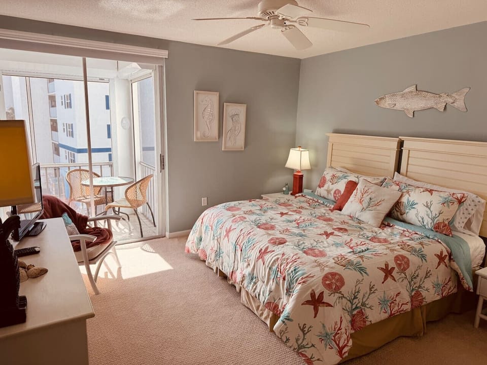A cozy guest bedroom with a king-size bed and Smart TV for added comfort.