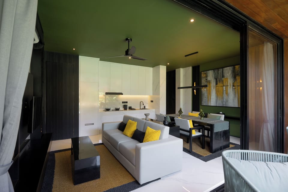 Deluxe Villa, 1 Bedroom, Balcony, Pool View | Living area | 32-inch Smart TV with digital channels