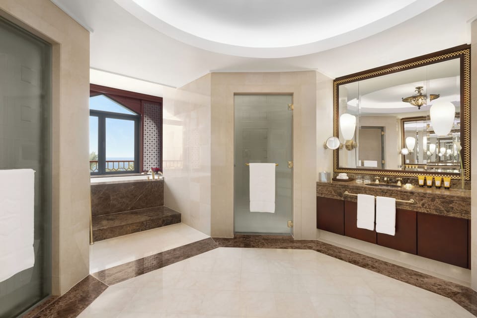 Royal Suite, 1 King Bed (Royal) | Bathroom | Separate tub and shower, hair dryer, bathrobes, slippers