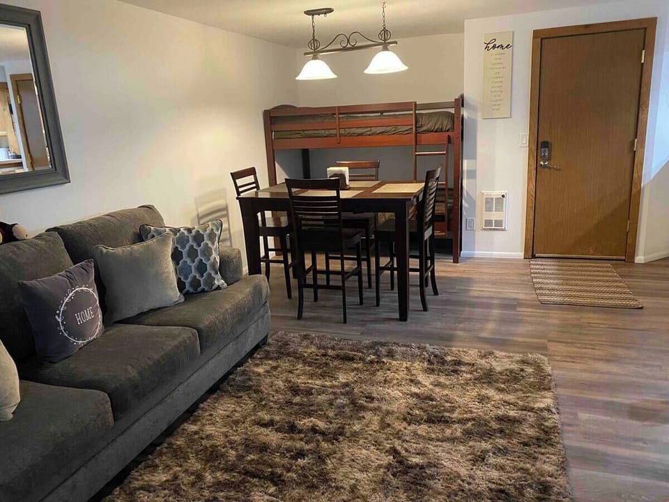 Comfort Condo, 1 Bedroom | Living area | Flat-screen TV