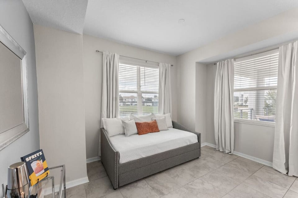 Modern open concept of living room, dining room and kitchen with island!#Disney #Parks #kingdom #springs #StoreyLake #Apartment #Vacation #Rental #waterpark #Kissimmee #Orlando #universal #citywalk