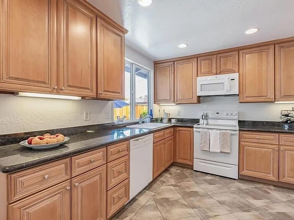 Fully-equipped kitchen · Hot water kettle · Nespresso machine · Re Freezer · Stove/Oven/Microwave · Dishwasher · Dishes and silverware · Coffee mugs and glass cups · Pots and cooking basics