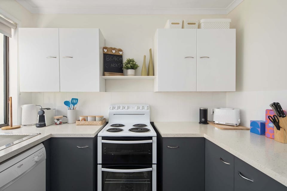 Start your mornings right with a convenient coffee pod machine—perfect for an easy caffeine fix before heading out to the beach.